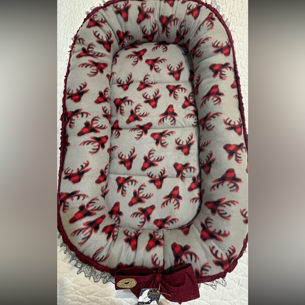 Baby snuggle nest bed.